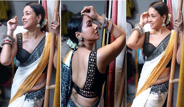 নতুন নতুন চমক নিয়ে হাজির হচ্ছেন রুনা খান