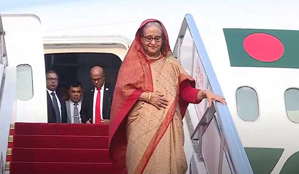 চীন সফর শেষে দেশে ফিরলেন প্রধানমন্ত্রী